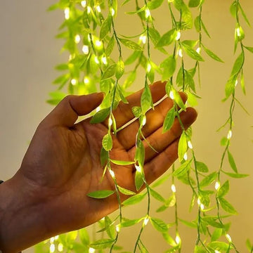 Jhalar Enchantment: Warm White, 10x3ft Artificial Vines with Flickering Leaves Garland Curtain Lights