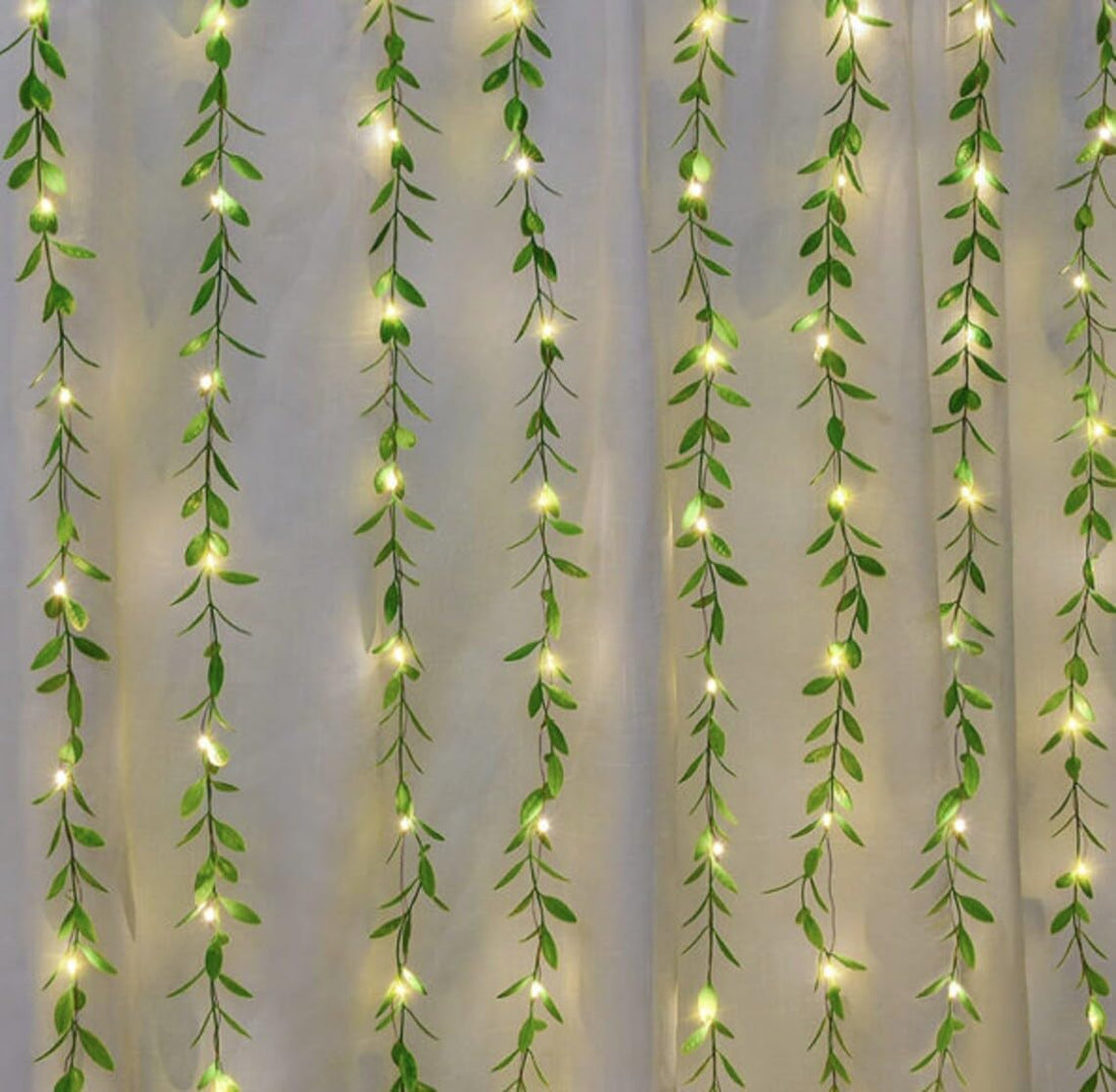 Jhalar Enchantment: Warm White, 10x3ft Artificial Vines with Flickering Leaves Garland Curtain Lights