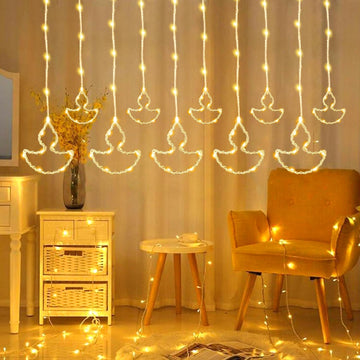 Gesto 10 Diya Curtain Lights – 111 SMD LED Warm White Fairy Lights with 8 Flashing Modes | AC Powered Diya Lights for Home,Balcony,Mandir, Pooja Room,Wedding,Diwali Decoration & Festival Decor (11 Ft)